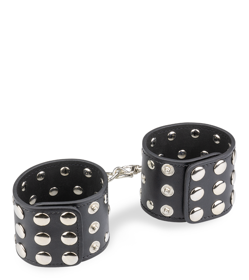 Menottes poignets cuir noir rivets