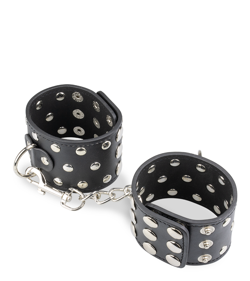 Menottes poignets cuir noir rivets
