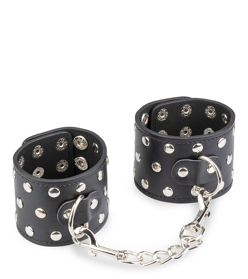 Menottes poignets cuir noir rivets