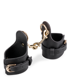 Menottes poignets similicuir Justice